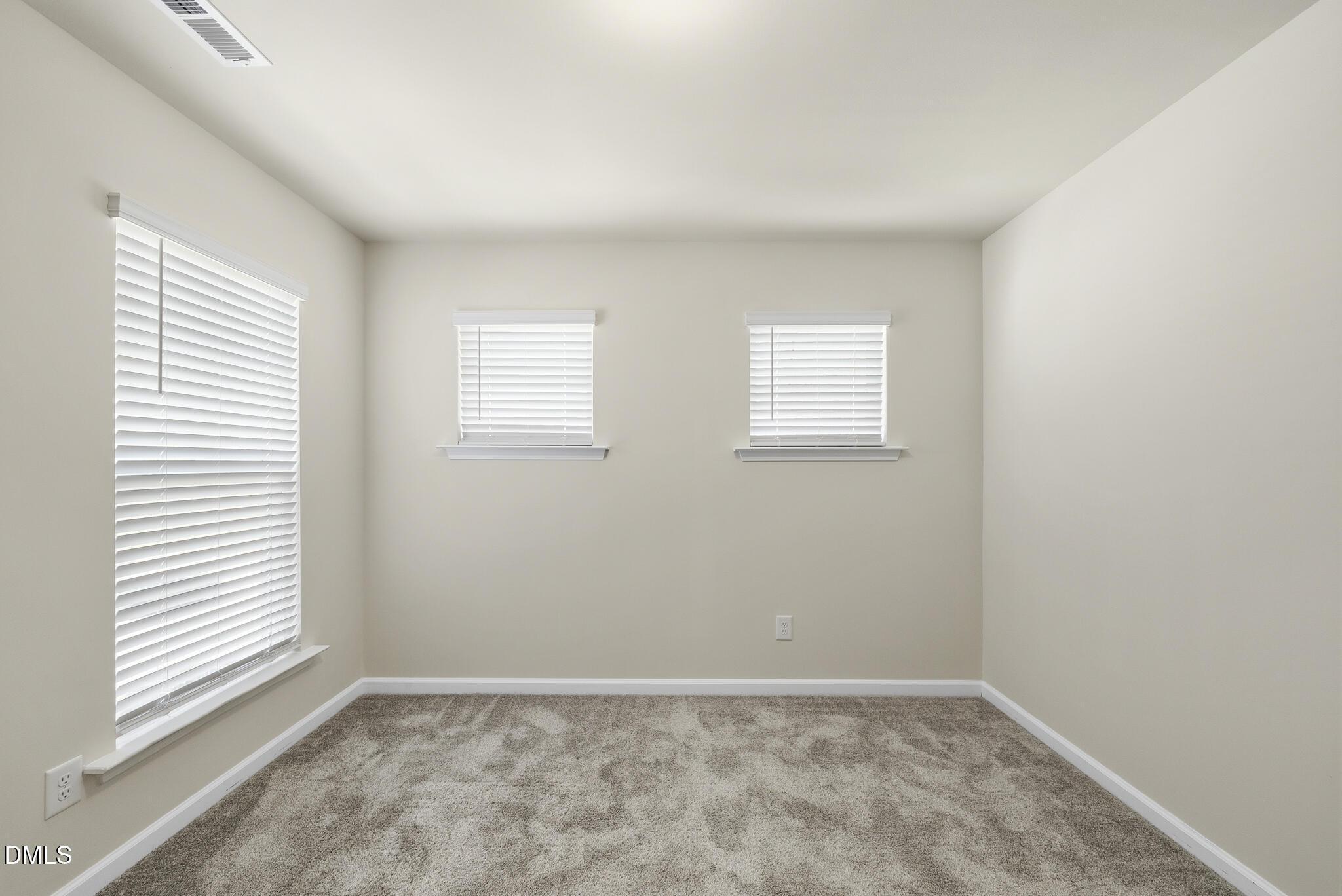 1012 Citadel Avenue Durham, NC 27713 - Photo 25 of 34 an empty room with windows