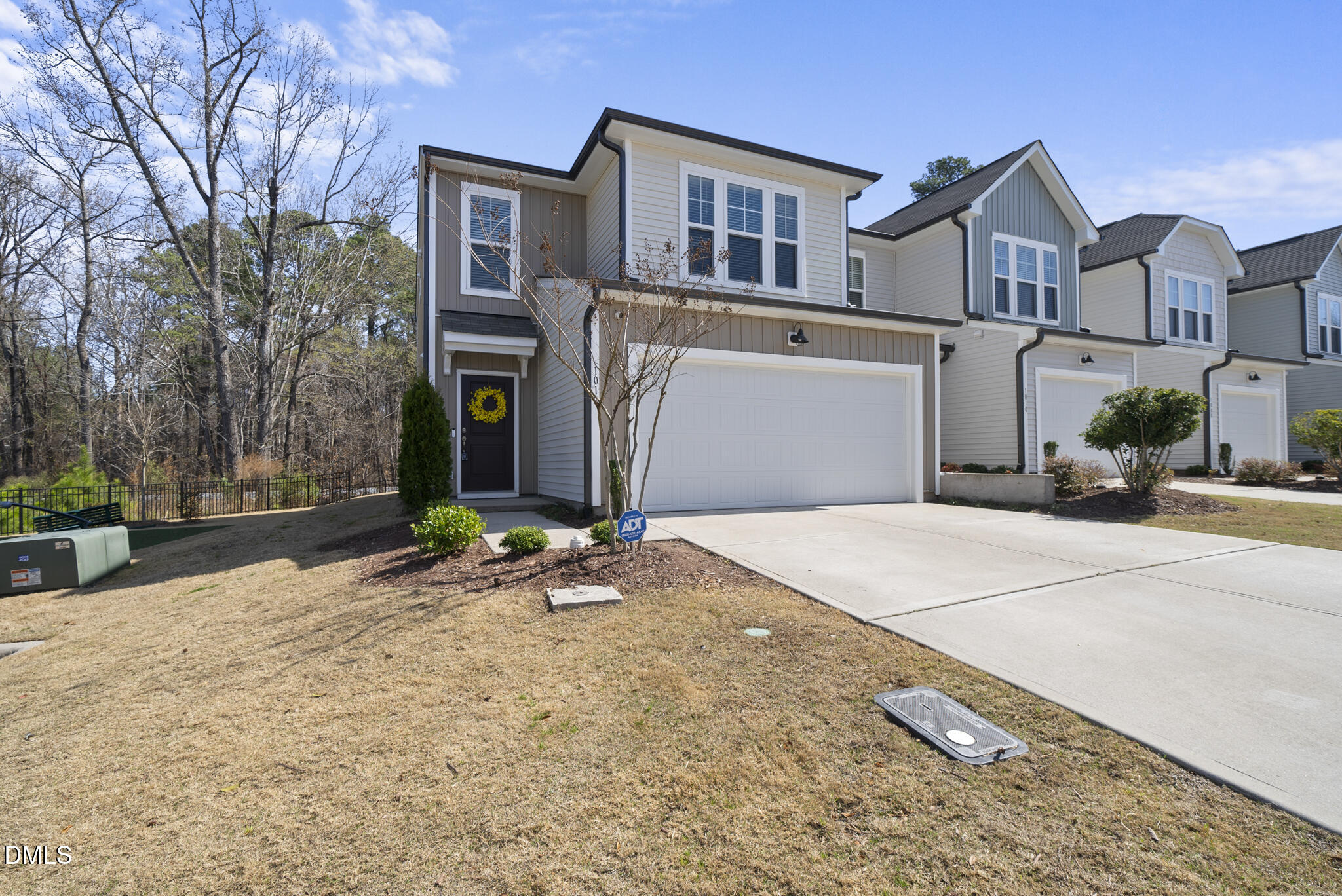 1012 Citadel Avenue Durham, NC 27713 - Photo 3 of 34 a front view of a house with a yard and garage