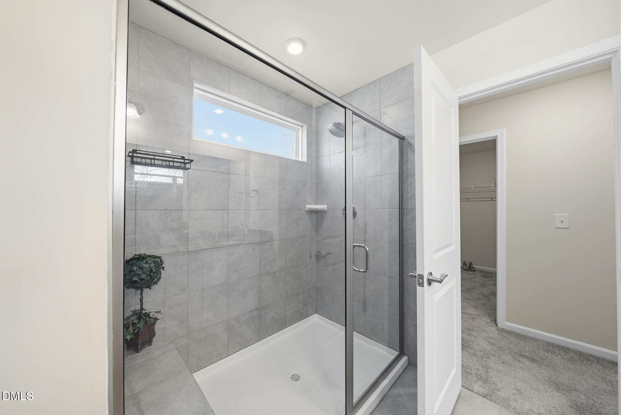 1012 Citadel Avenue Durham, NC 27713 - Photo 33 of 34 a bathroom with a bathtub and a shower