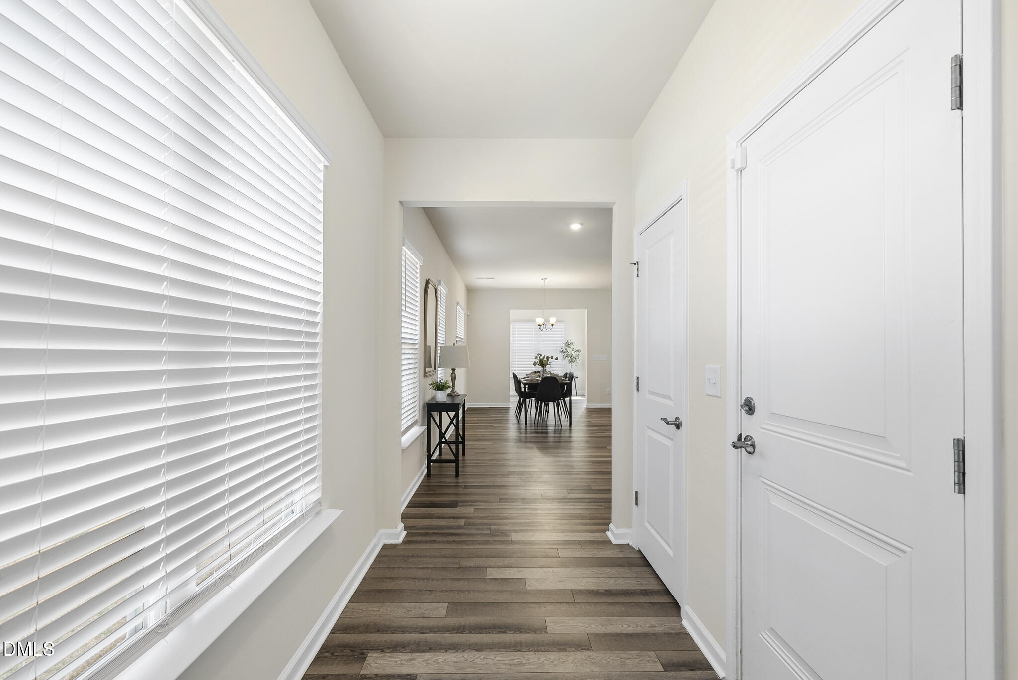 1012 Citadel Avenue Durham, NC 27713 - Photo 4 of 34 a hallway with wooden floor and windows