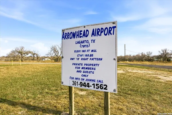a sign board on the top of a building