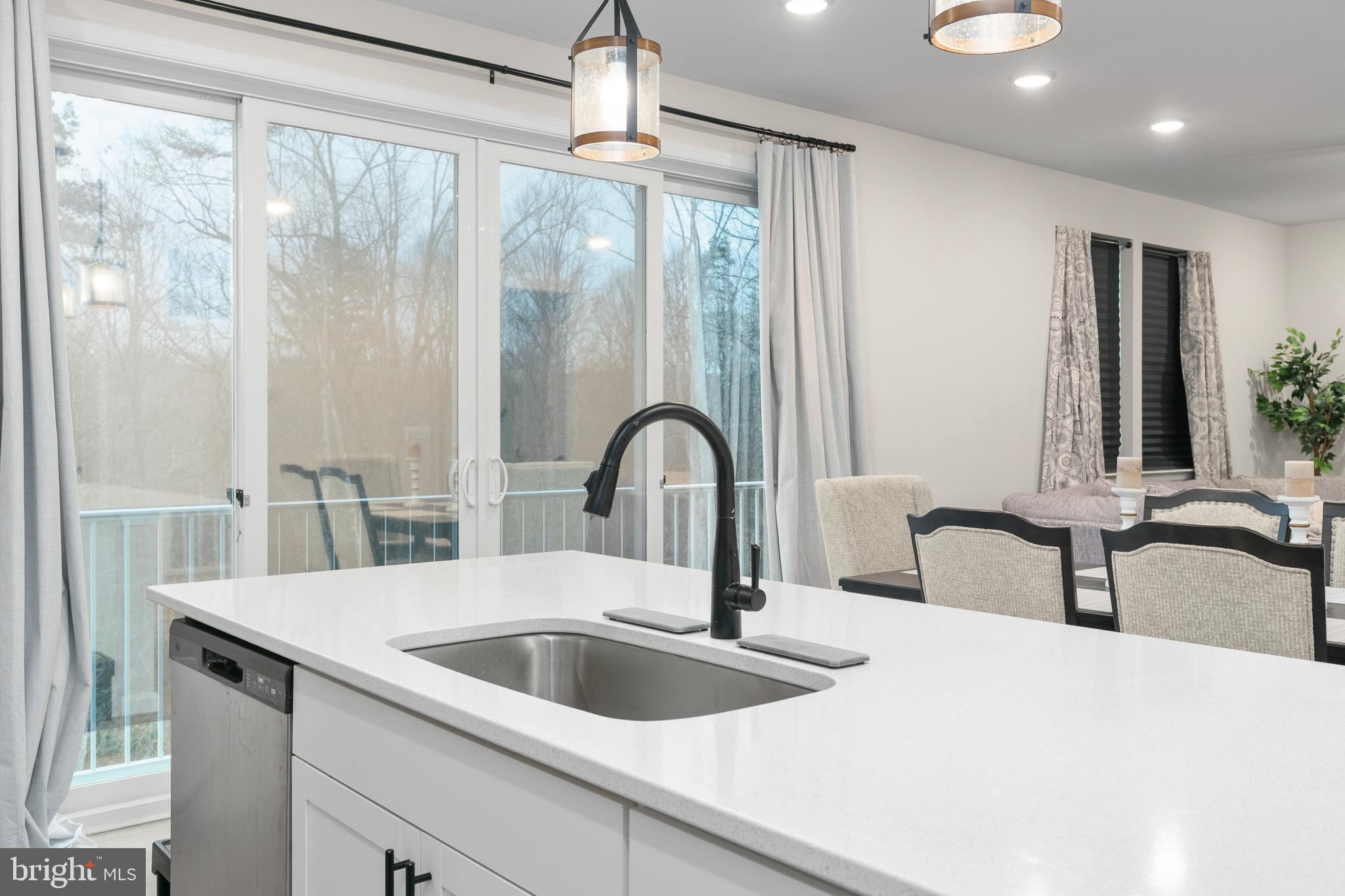 35514 Aspen Way Locust Grove, VA 22508 - Photo 14 of 56 a kitchen with a sink and a large window