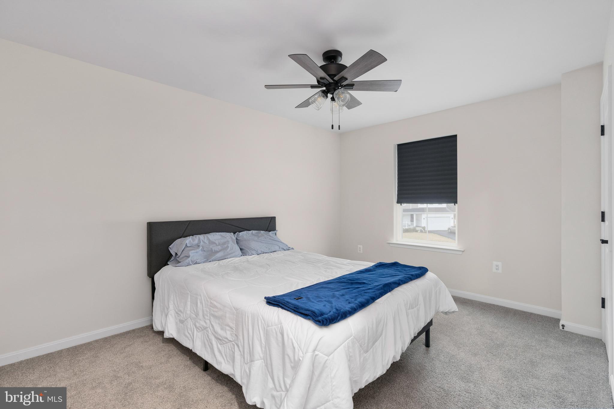 35514 Aspen Way Locust Grove, VA 22508 - Photo 26 of 56 a bedroom with a bed and a window