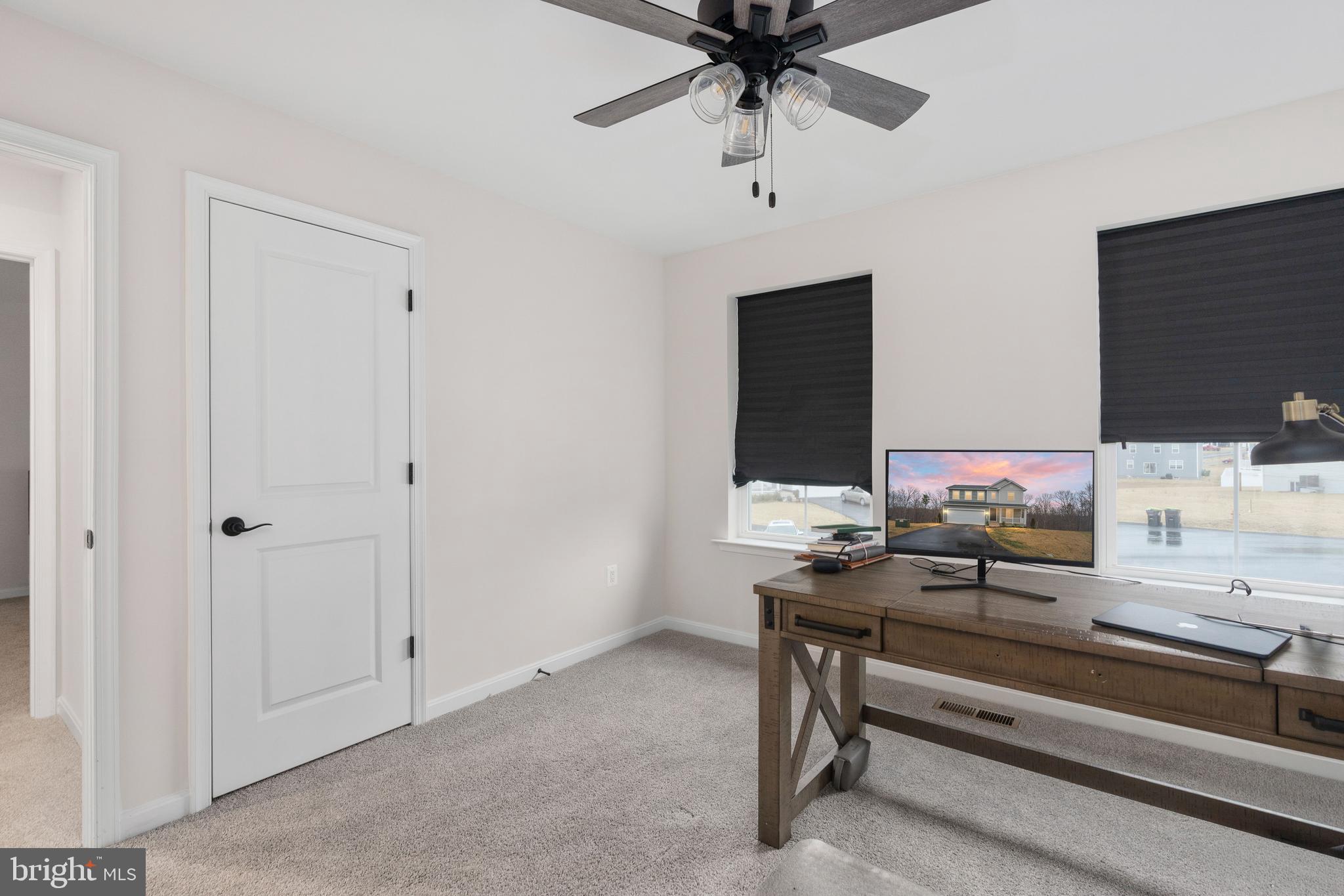 35514 Aspen Way Locust Grove, VA 22508 - Photo 27 of 56 a living room with furniture and a flat screen tv