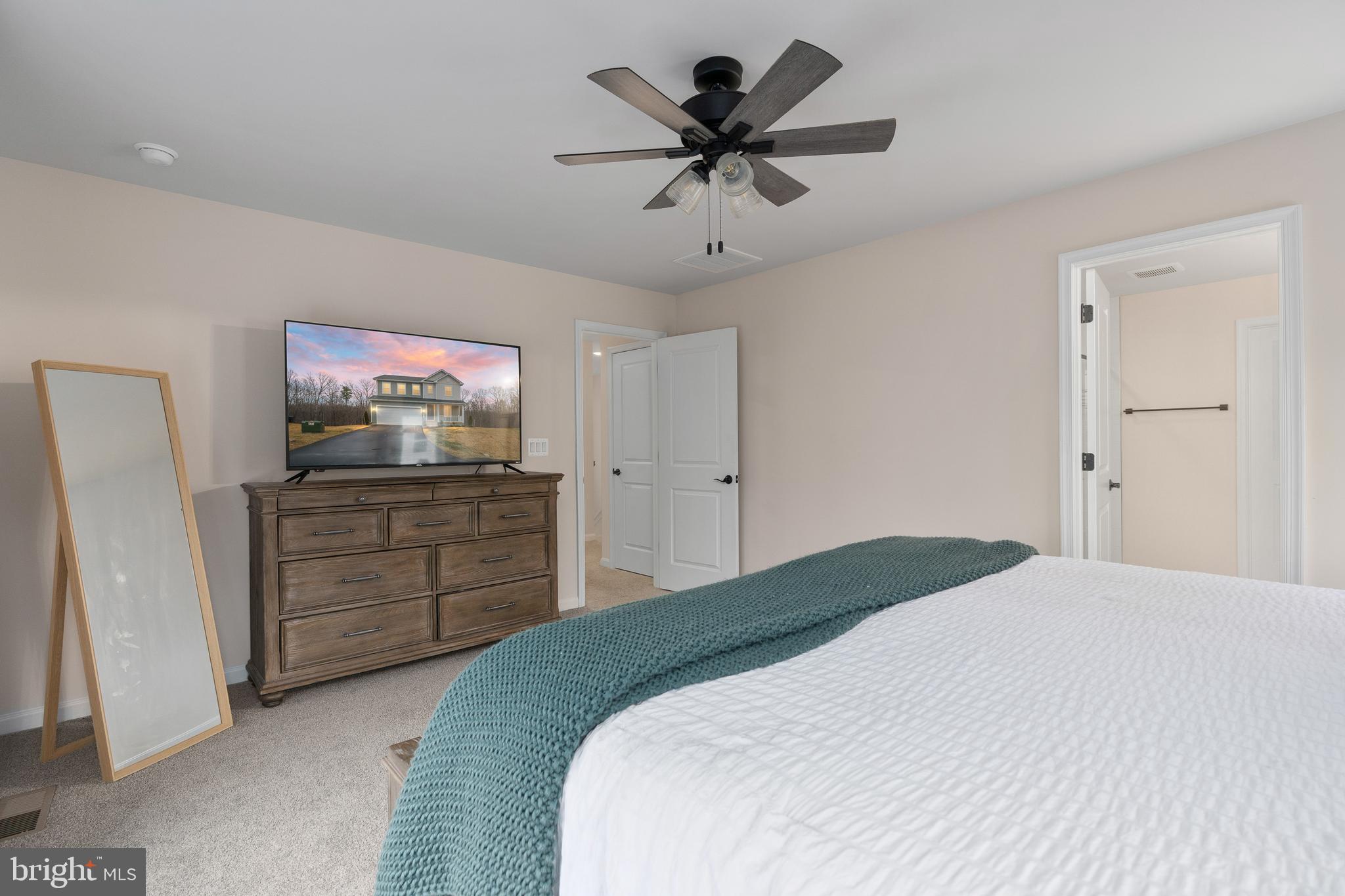 35514 Aspen Way Locust Grove, VA 22508 - Photo 37 of 56 a bedroom with a bed and a dresser