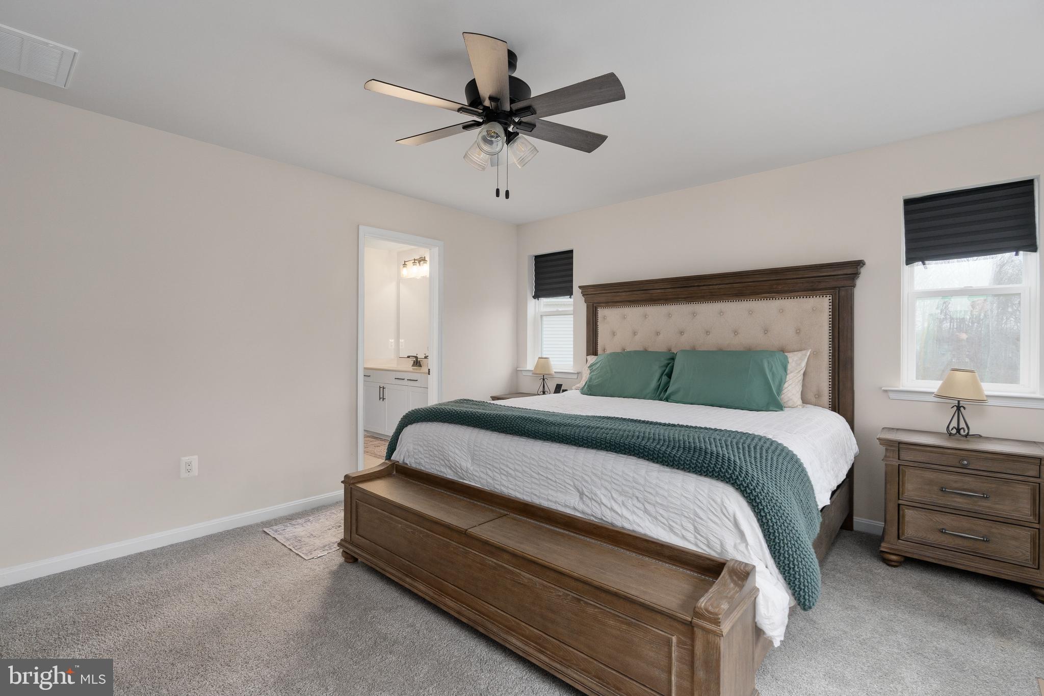 35514 Aspen Way Locust Grove, VA 22508 - Photo 39 of 56 a bedroom with bed and a ceiling fan