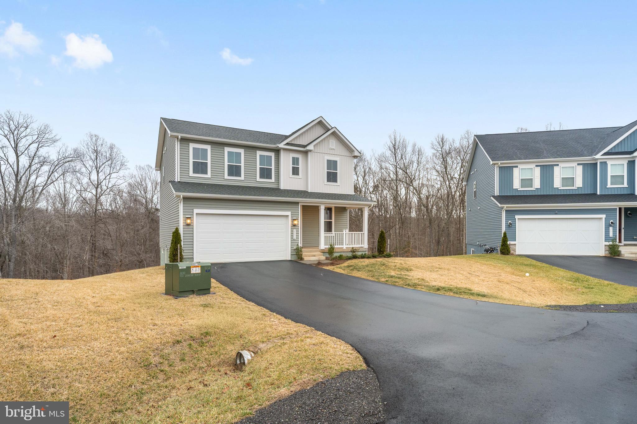 35514 Aspen Way Locust Grove, VA 22508 - Photo 49 of 56 a front view of house with yard and trees