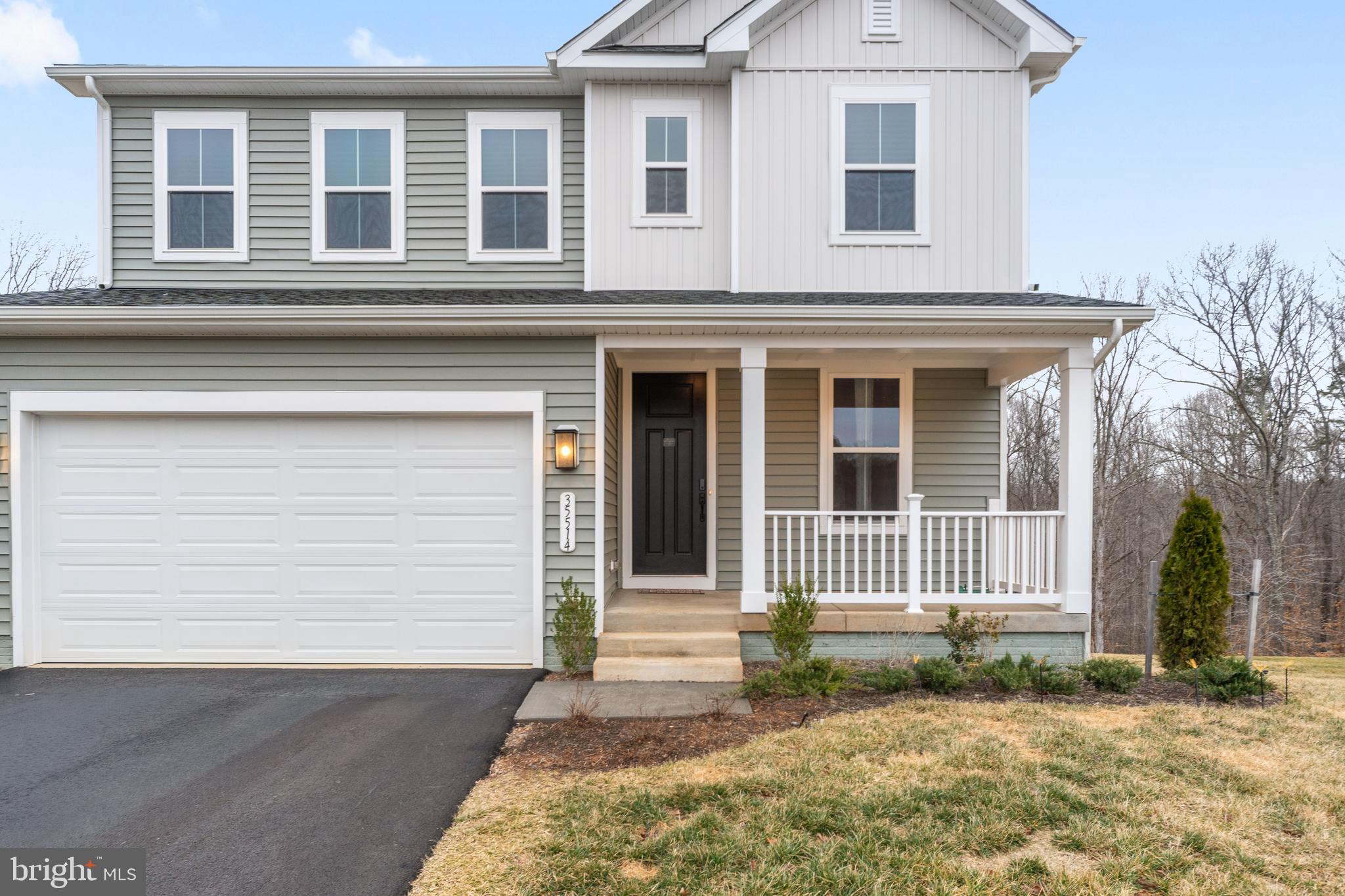 35514 Aspen Way Locust Grove, VA 22508 - Photo 50 of 56 a front view of a house with a garden