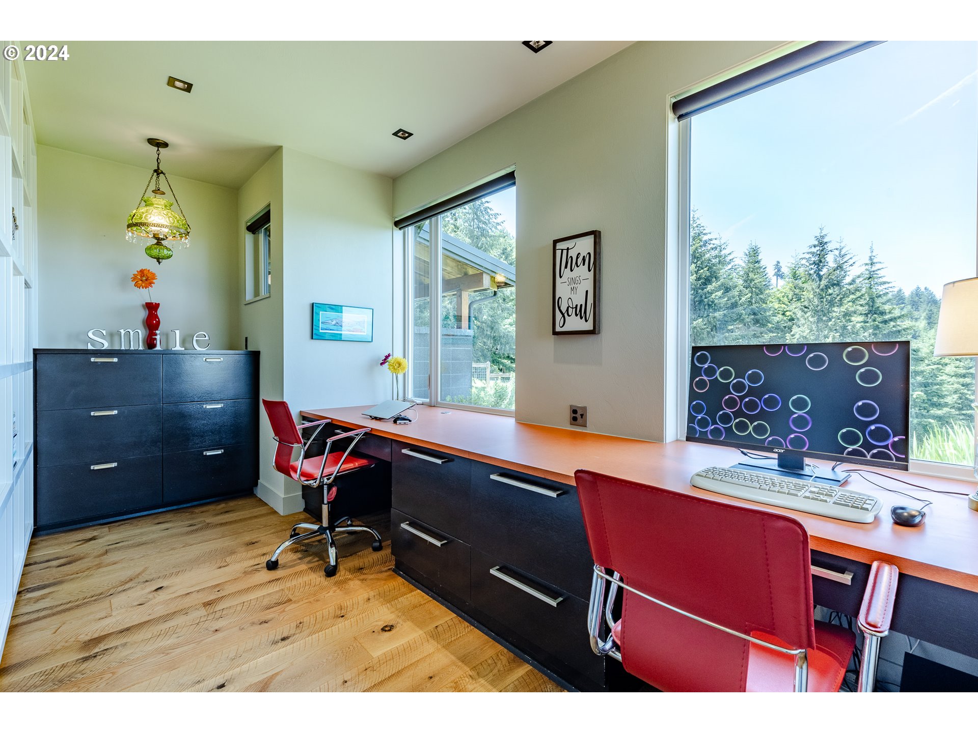 90535 Coburghills Drive Eugene, OR 97408 - Photo 20 of 48 a room with a wooden table and chairs