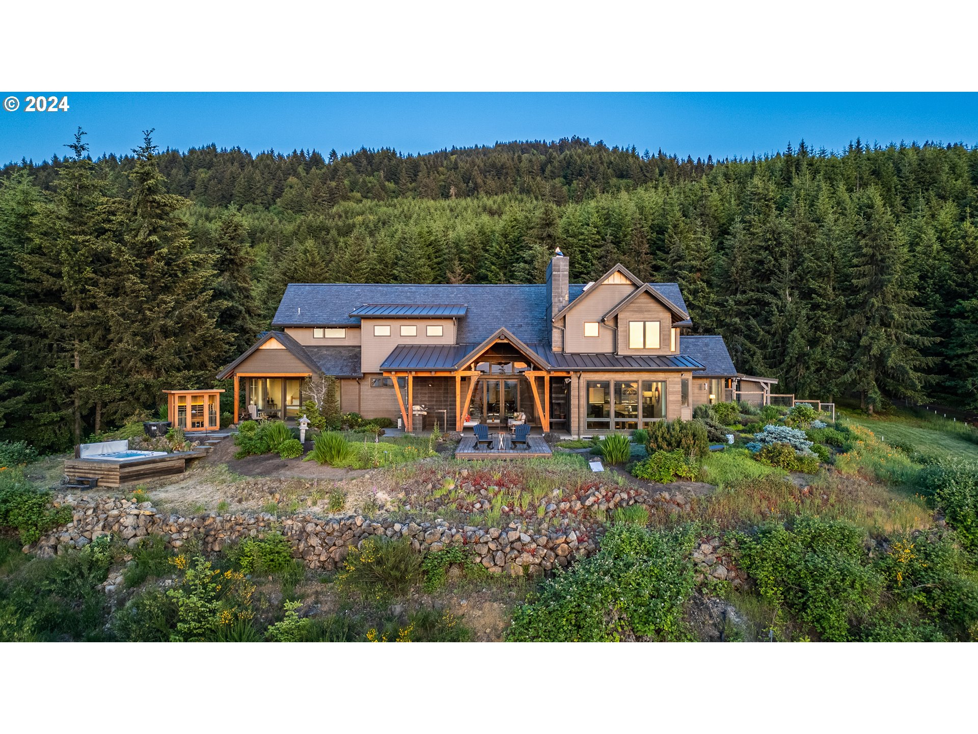90535 Coburghills Drive Eugene, OR 97408 - Photo 2 of 48 a view of a big house with a big yard and large tree