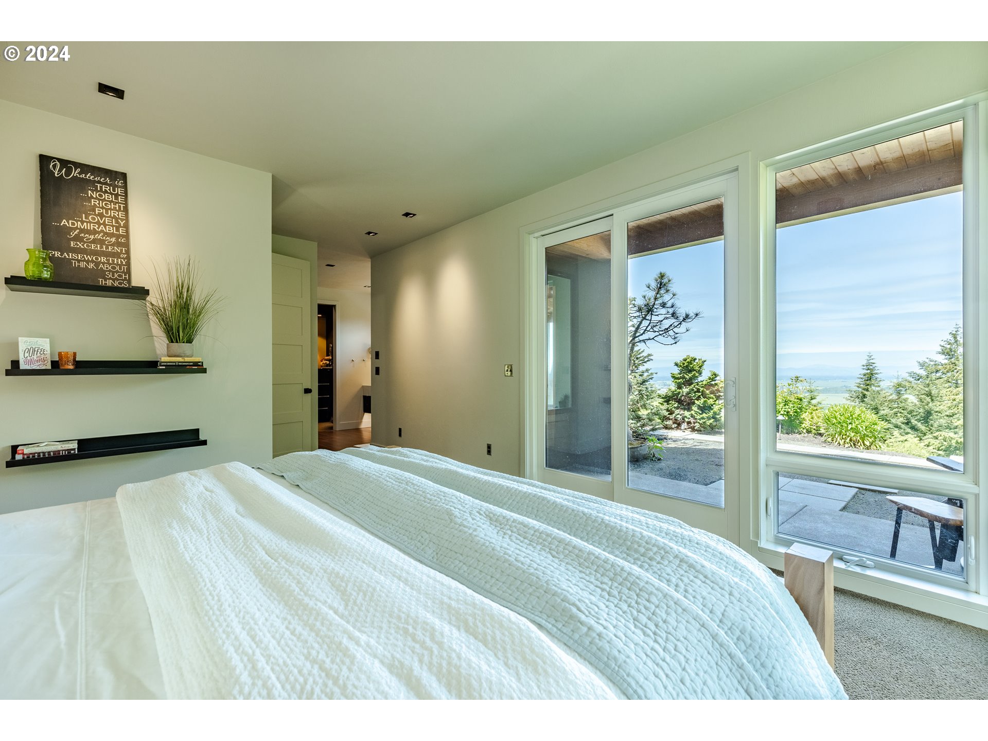 90535 Coburghills Drive Eugene, OR 97408 - Photo 23 of 48 a bedroom with a bed and a large window