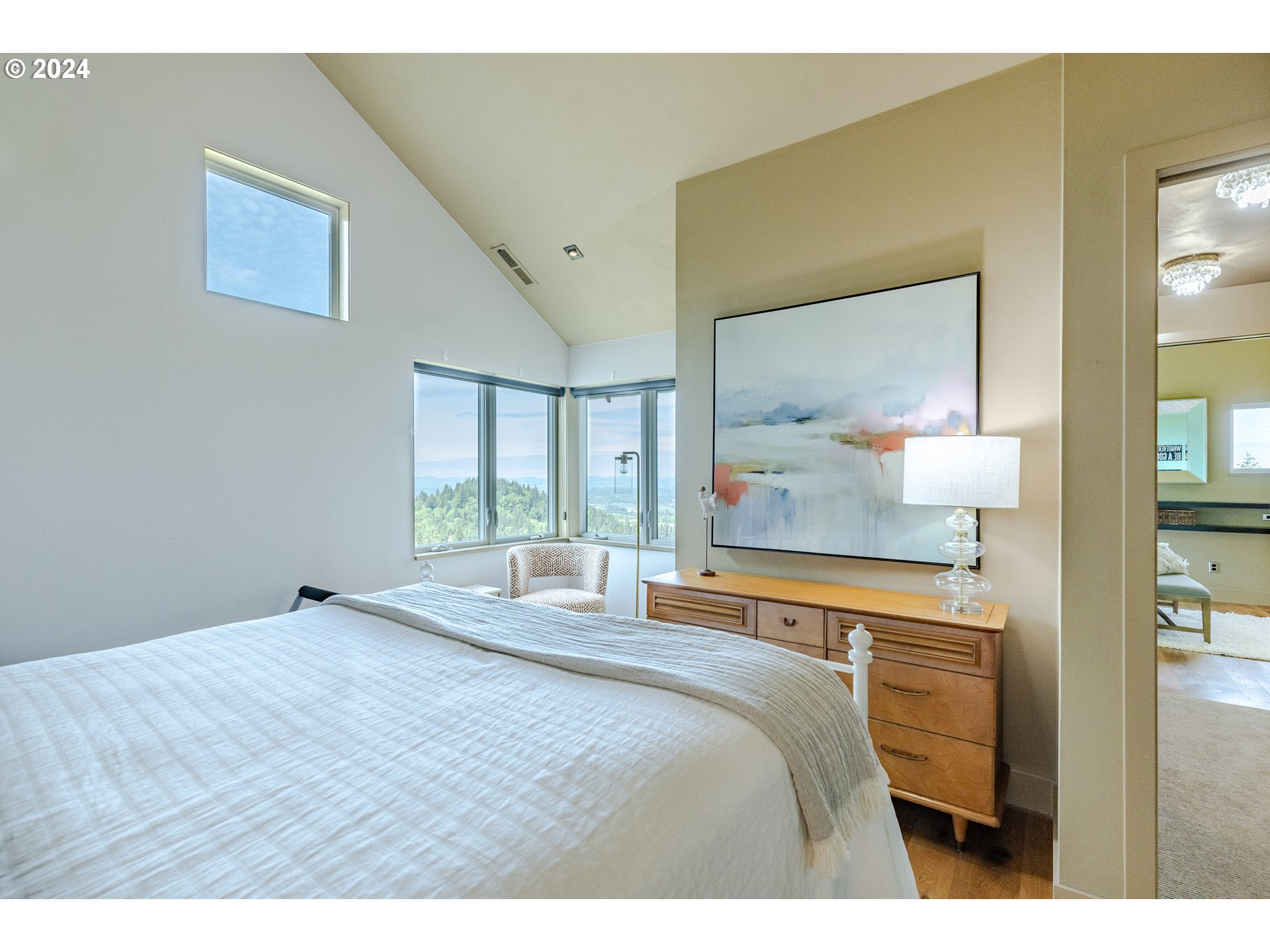 90535 Coburghills Drive Eugene, OR 97408 - Photo 27 of 48 a bedroom with a bed and a night stand