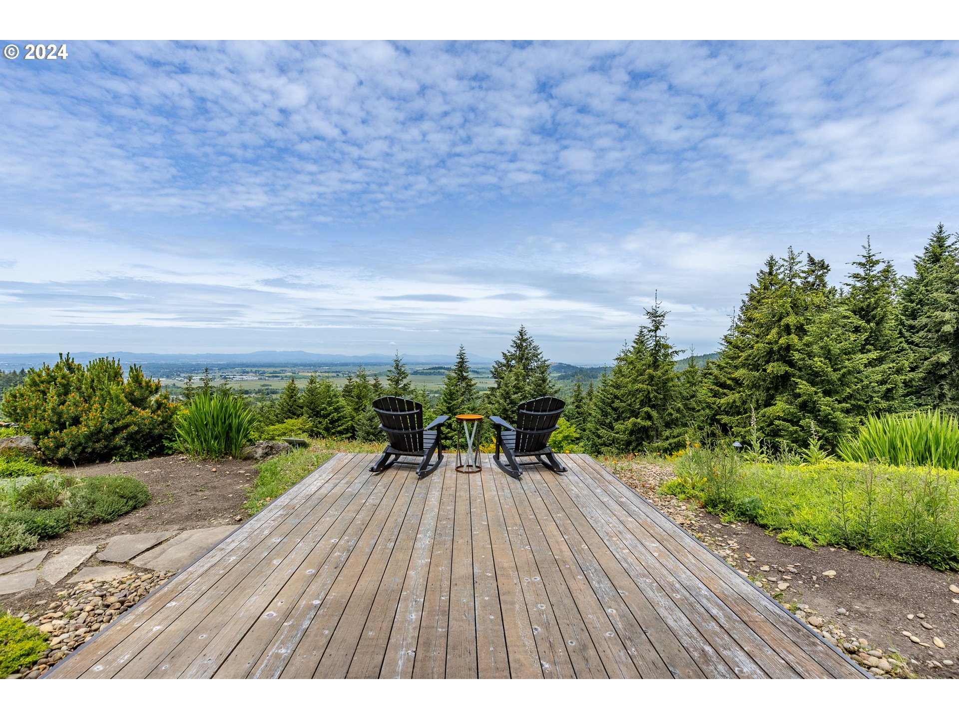 90535 Coburghills Drive Eugene, OR 97408 - Photo 35 of 48 a view of a backyard with sitting area