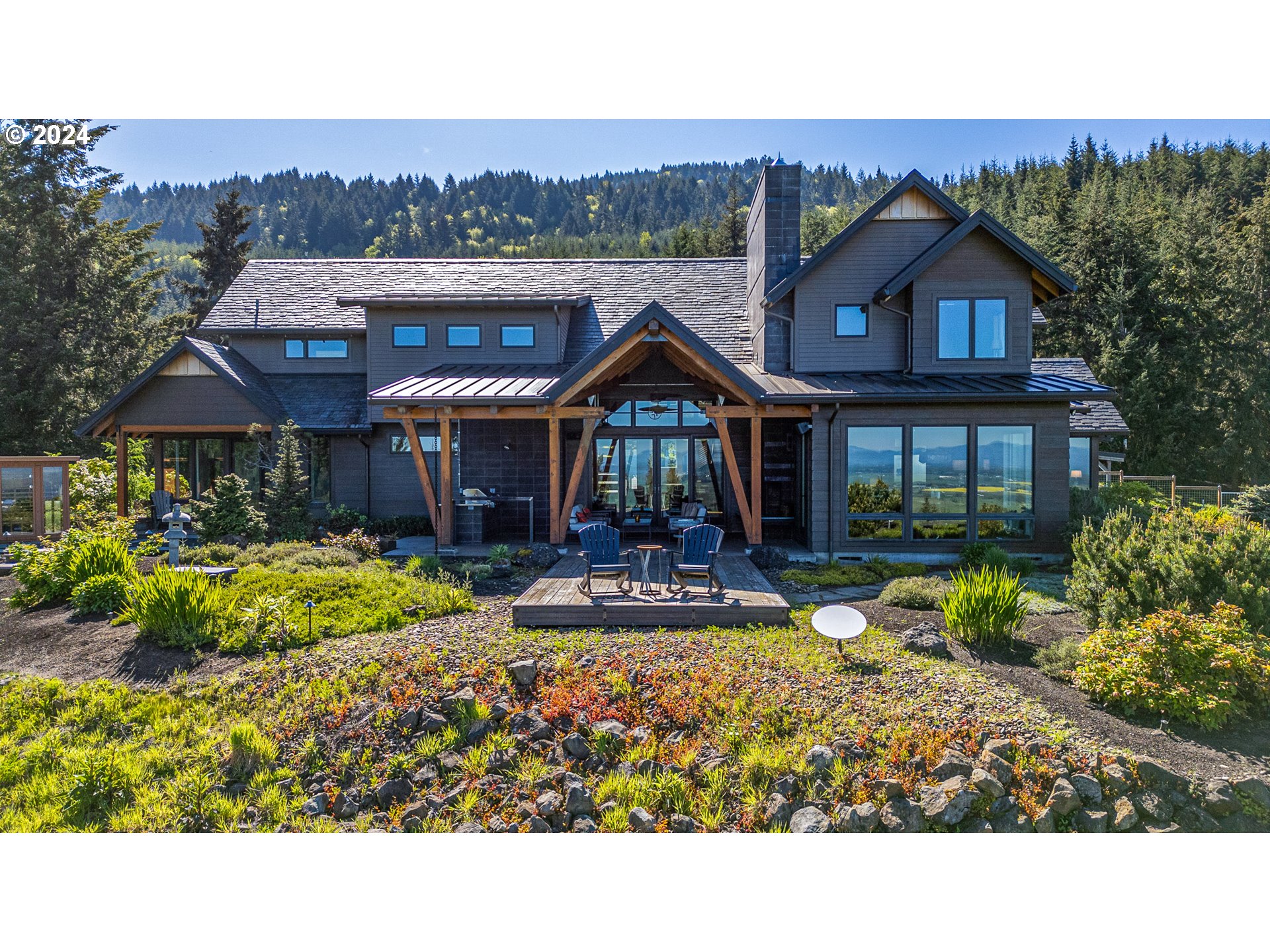 90535 Coburghills Drive Eugene, OR 97408 - Photo 37 of 48 a house view with a garden space