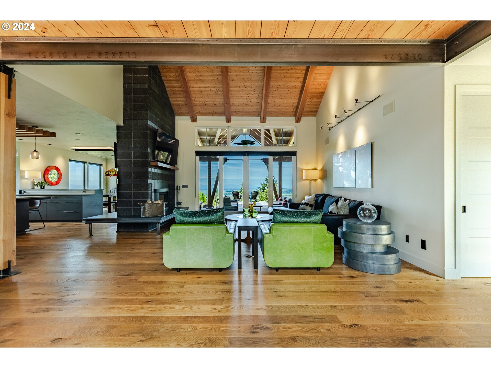 90535 Coburghills Drive Eugene, OR 97408 - Photo 5 of 48 a living room with furniture and a wooden floor