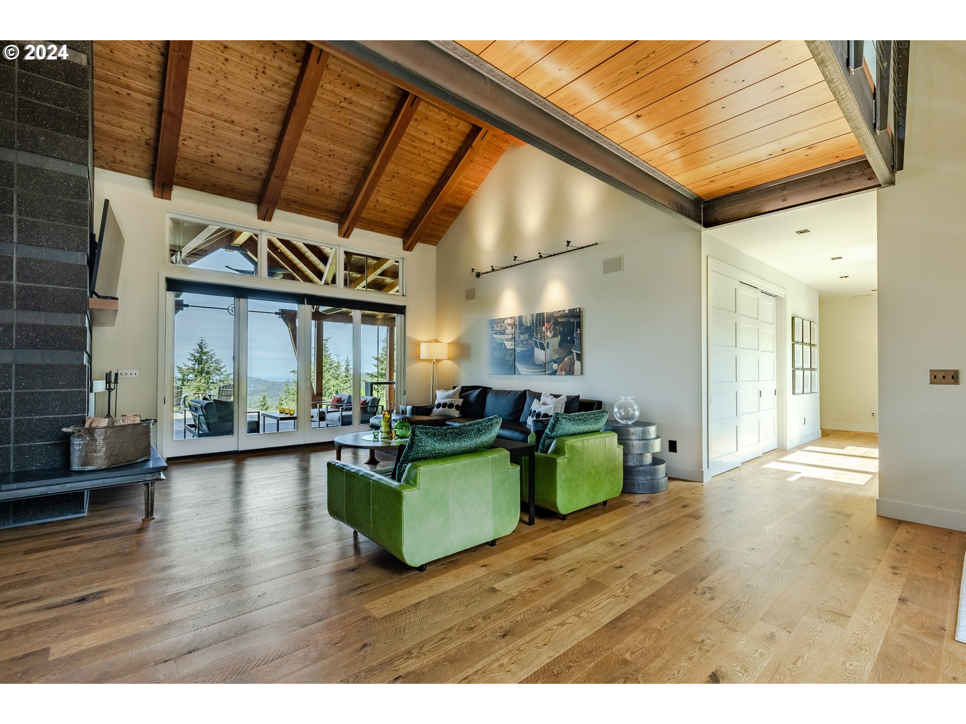 90535 Coburghills Drive Eugene, OR 97408 - Photo 9 of 48 a view of living room kitchen with furniture and wooden floor