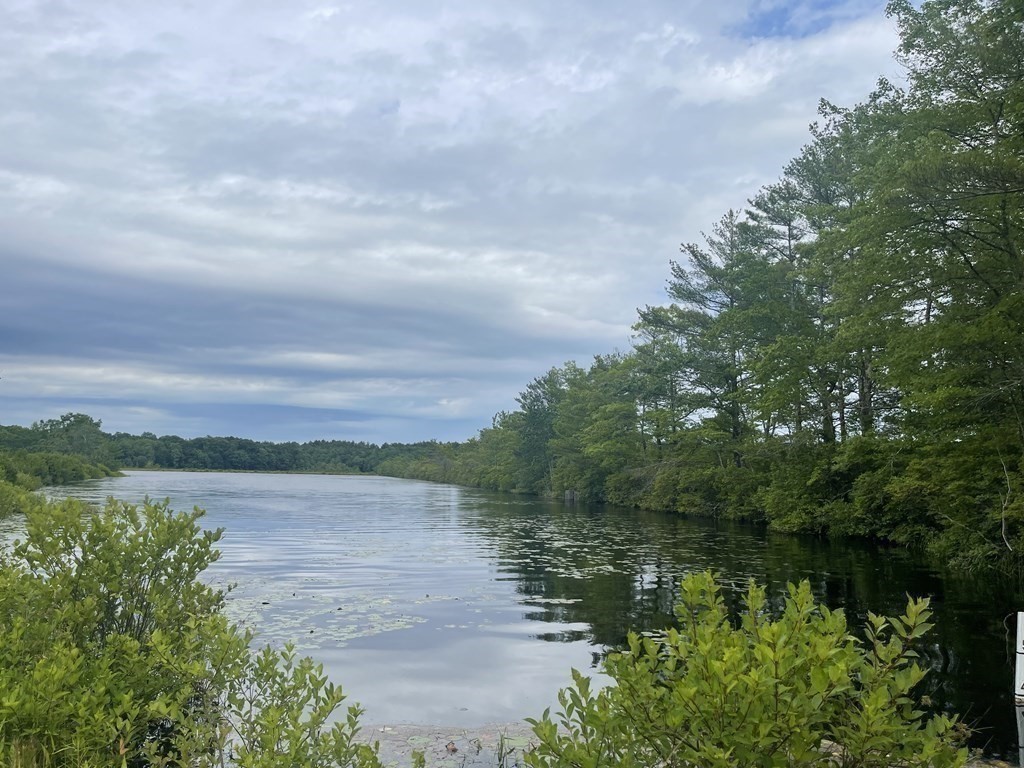 1 Elm Street Halifax, MA 02338 - Photo 16 of 26 a view of a lake with a big yard