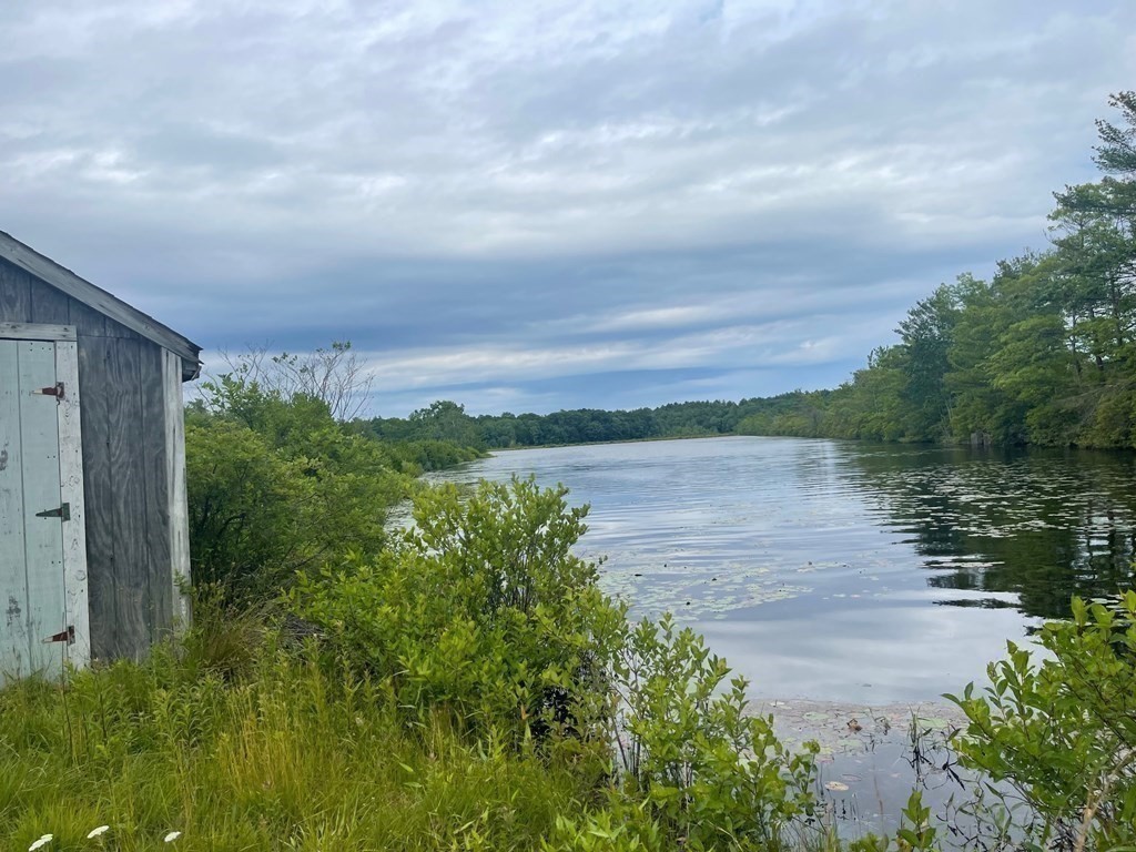 1 Elm Street Halifax, MA 02338 - Photo 21 of 26 a view of a lake with a yard