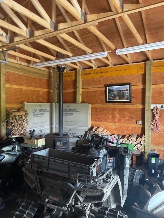 1 Elm Street Halifax, MA 02338 - Photo 9 of 26 a roof deck with table and chairs