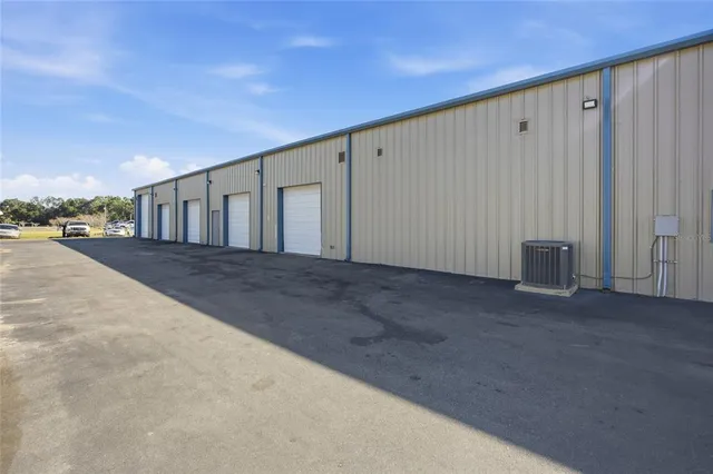 an aerial view of residential house with outdoor space