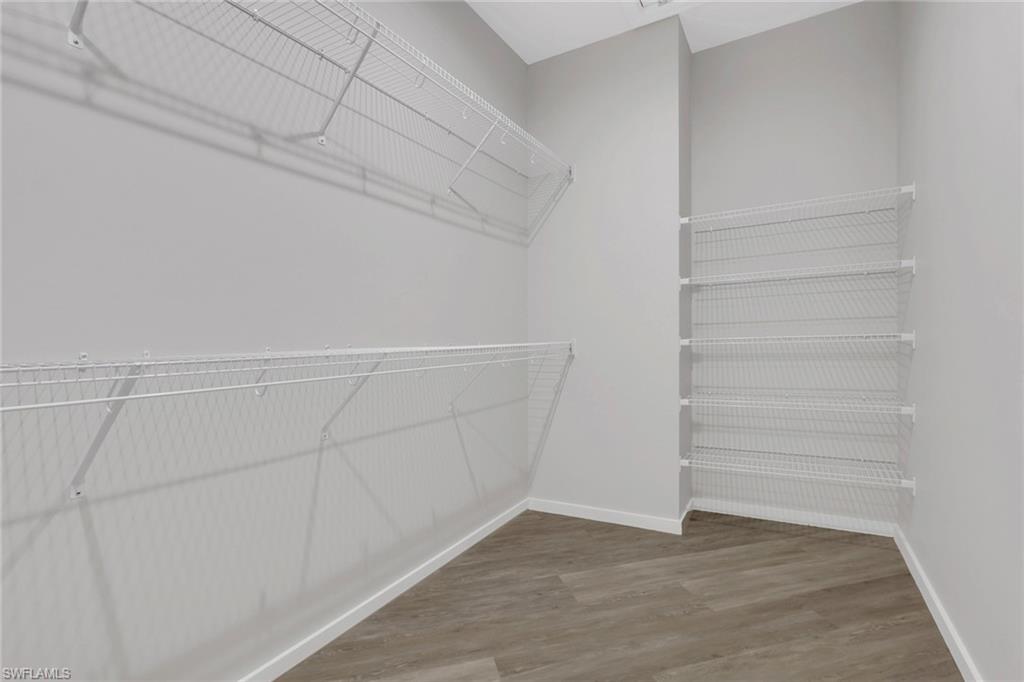 3500 Croton Road, Unit 102 Naples, FL 34104 - Photo 13 of 27 a view of an empty walk in closet