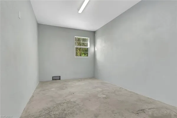 an empty room with a window