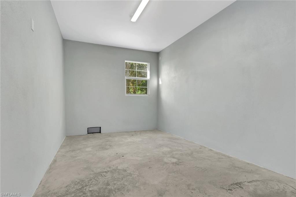 3500 Croton Road, Unit 102 Naples, FL 34104 - Photo 27 of 27 an empty room with a window