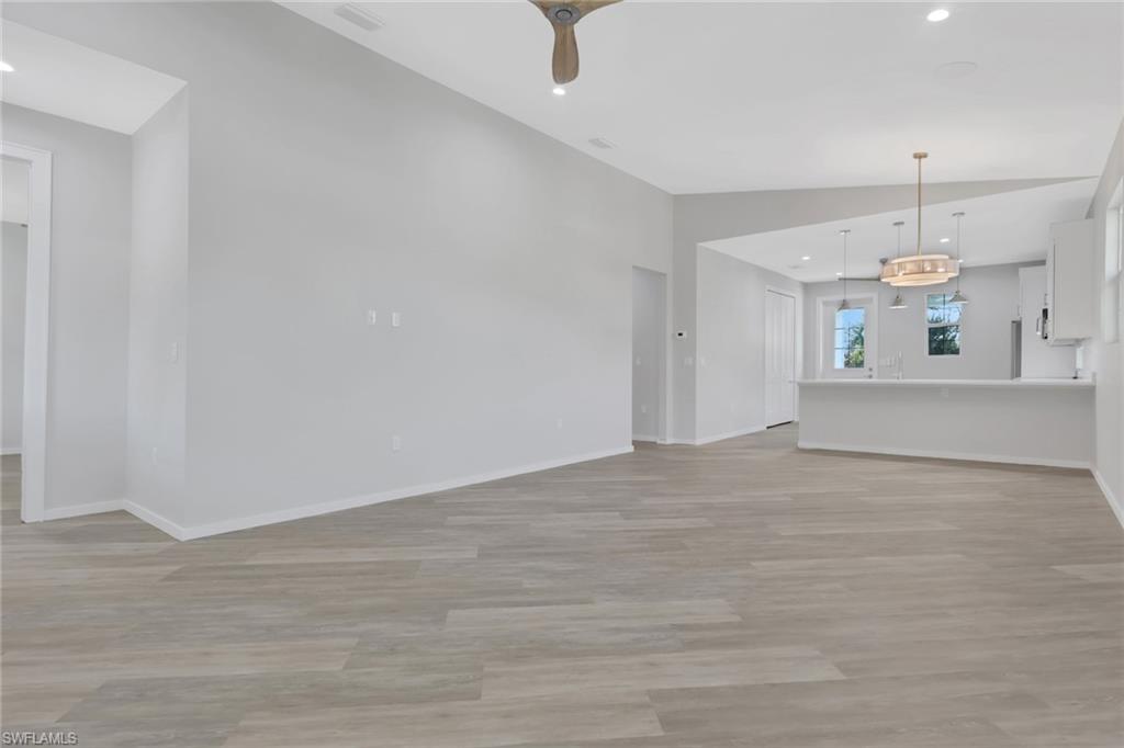 3500 Croton Road, Unit 102 Naples, FL 34104 - Photo 4 of 27 a view of a kitchen with a sink and a window