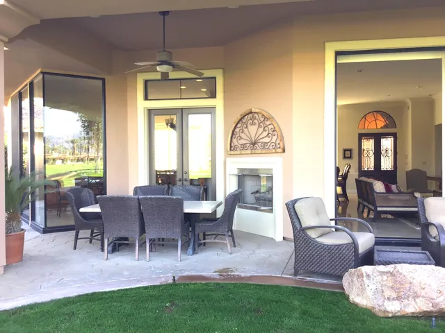 a view of a livingroom with furniture window and outside view