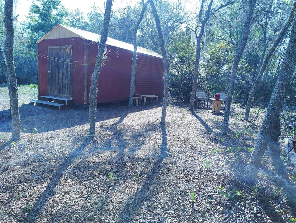 1873 West Foxglove Road Avon Park, FL 33825 - Photo 2 of 14 a view of a backyard