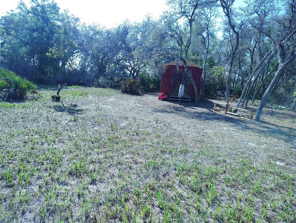 1873 West Foxglove Road Avon Park, FL 33825 - Photo 9 of 14 a view of backyard with green space