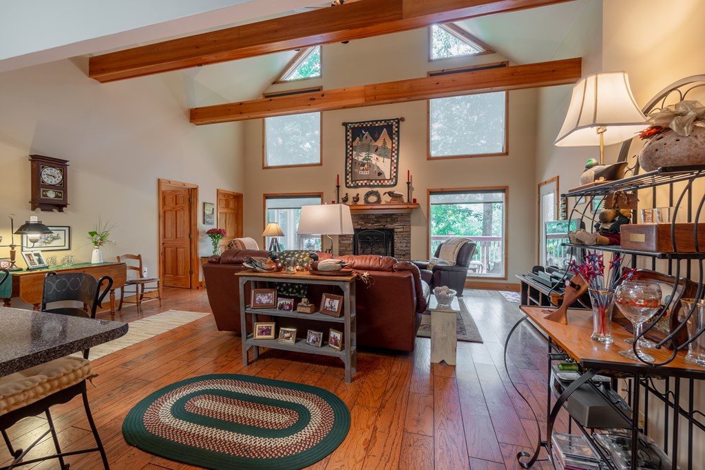636 Kings Gap Road Hamilton, GA 31811 - Photo 11 of 63 a living room with fireplace furniture and a wooden floor