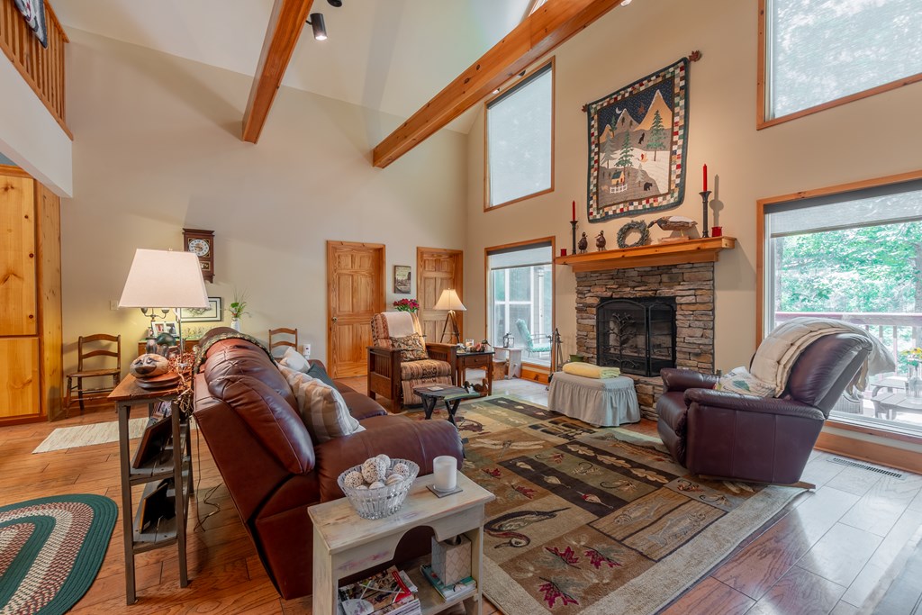 636 Kings Gap Road Hamilton, GA 31811 - Photo 12 of 63 a living room with furniture fireplace and a fireplace