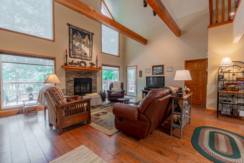 636 Kings Gap Road Hamilton, GA 31811 - Photo 13 of 63 a living room with furniture and a fireplace