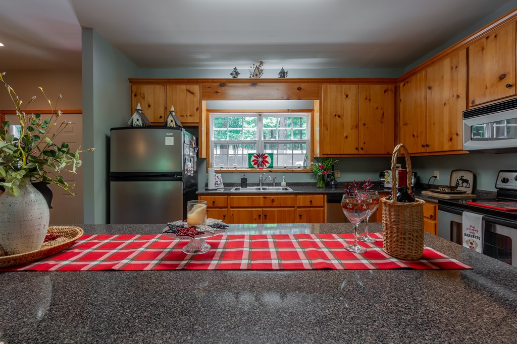 636 Kings Gap Road Hamilton, GA 31811 - Photo 18 of 63 a bedroom with large bed and a window