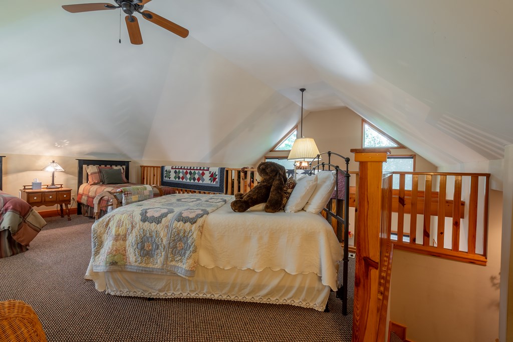 636 Kings Gap Road Hamilton, GA 31811 - Photo 20 of 63 a bedroom with a bed and window