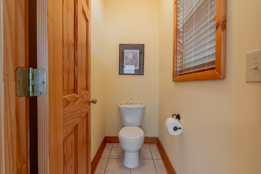 636 Kings Gap Road Hamilton, GA 31811 - Photo 29 of 63 a bathroom with a toilet and a shower