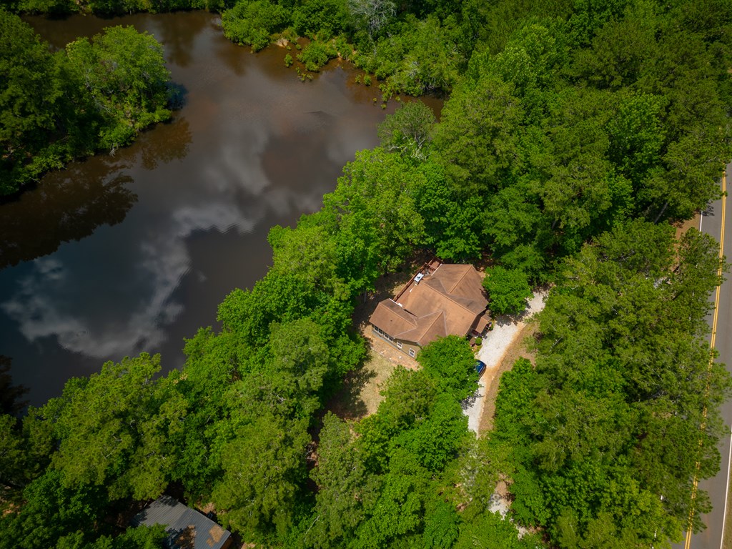 636 Kings Gap Road Hamilton, GA 31811 - Photo 51 of 63 an aerial view of a house with a yard and a garden