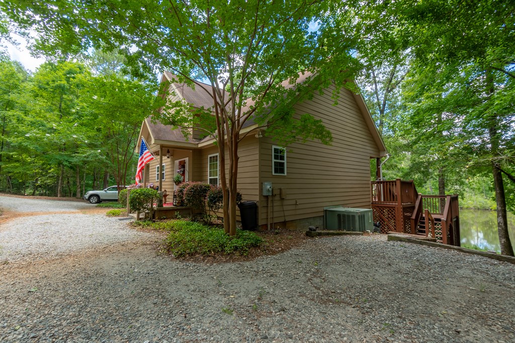 636 Kings Gap Road Hamilton, GA 31811 - Photo 6 of 63 a view of a house with a yard and sitting area