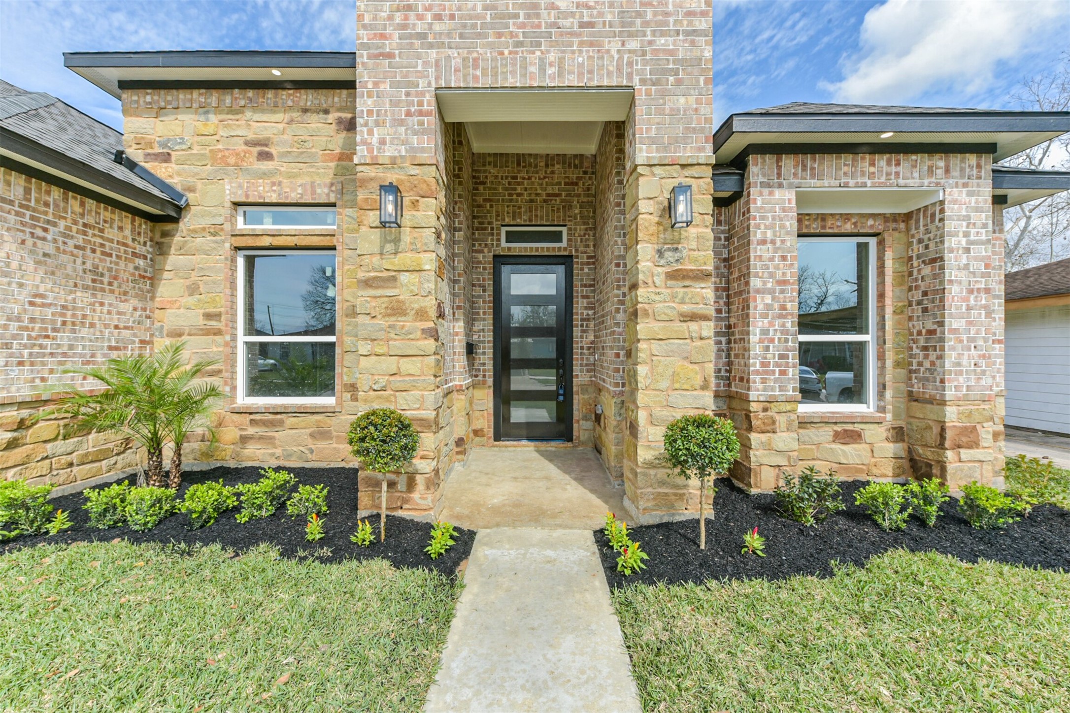 2803 Lancaster Lane Pasadena, TX 77506 - Photo 43 of 45 a front view of a house with garden