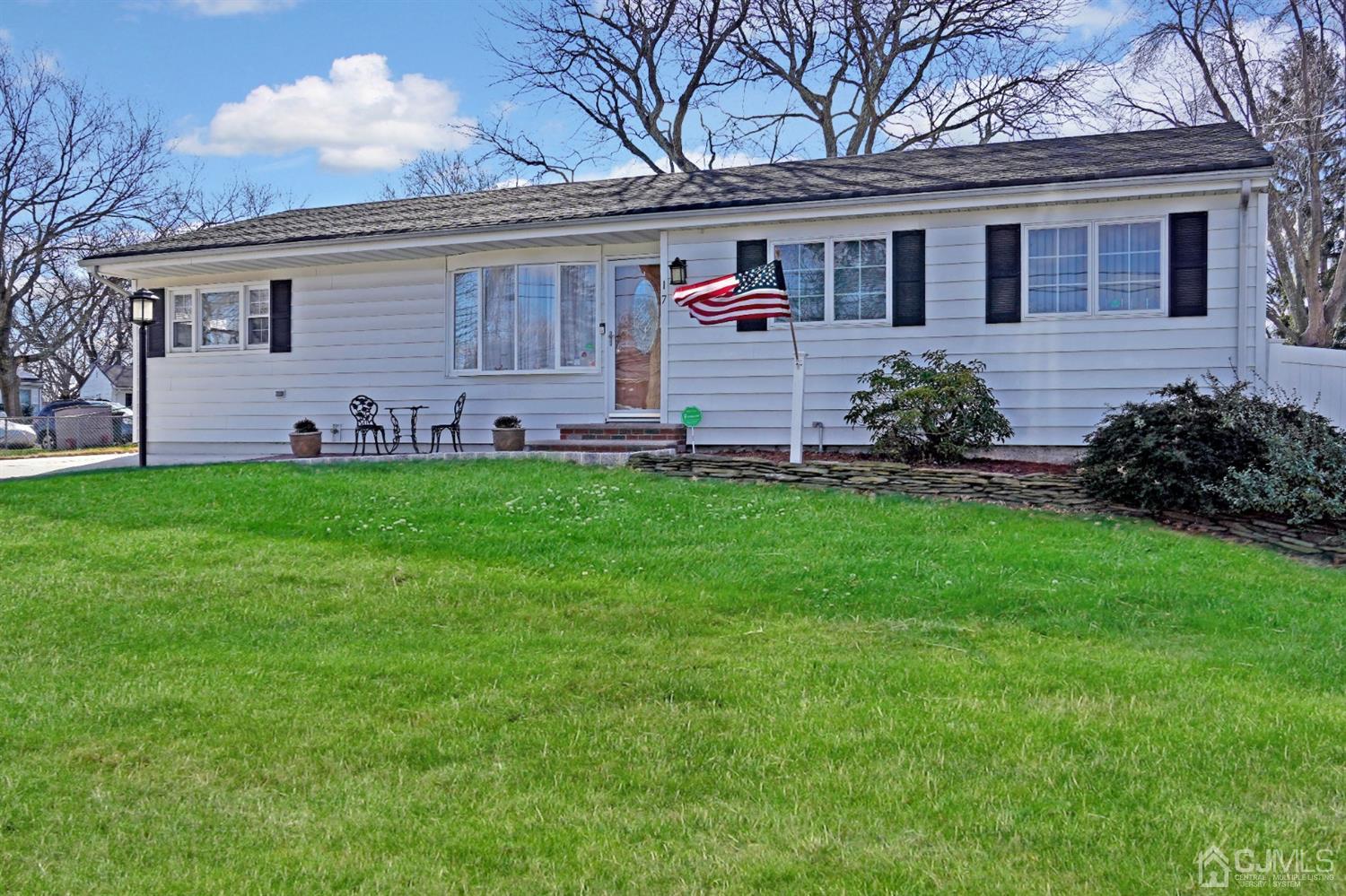 17 Bucknell Road Old Bridge, NJ 08859 - Photo 1 of 28 a front view of a house with a garden