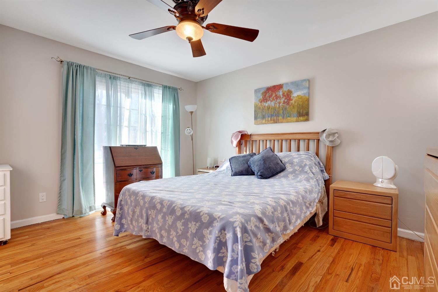 17 Bucknell Road Old Bridge, NJ 08859 - Photo 17 of 28 a bedroom with bed and wooden floor