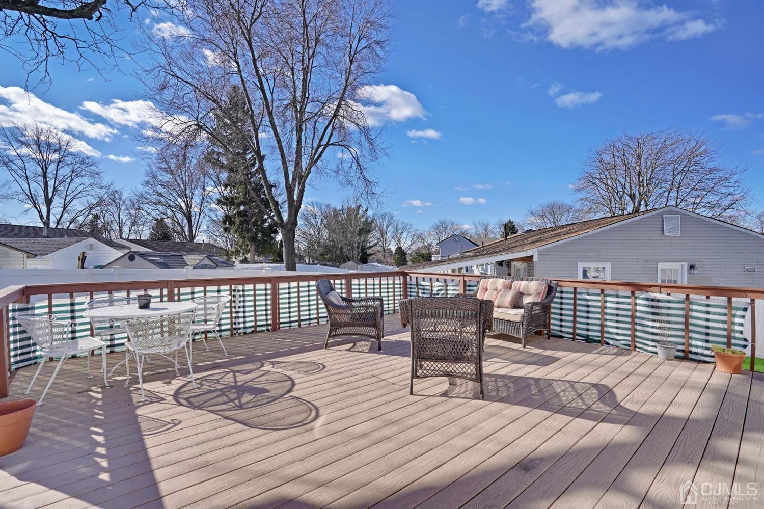 17 Bucknell Road Old Bridge, NJ 08859 - Photo 25 of 28 a view of a deck with wooden floor and fence