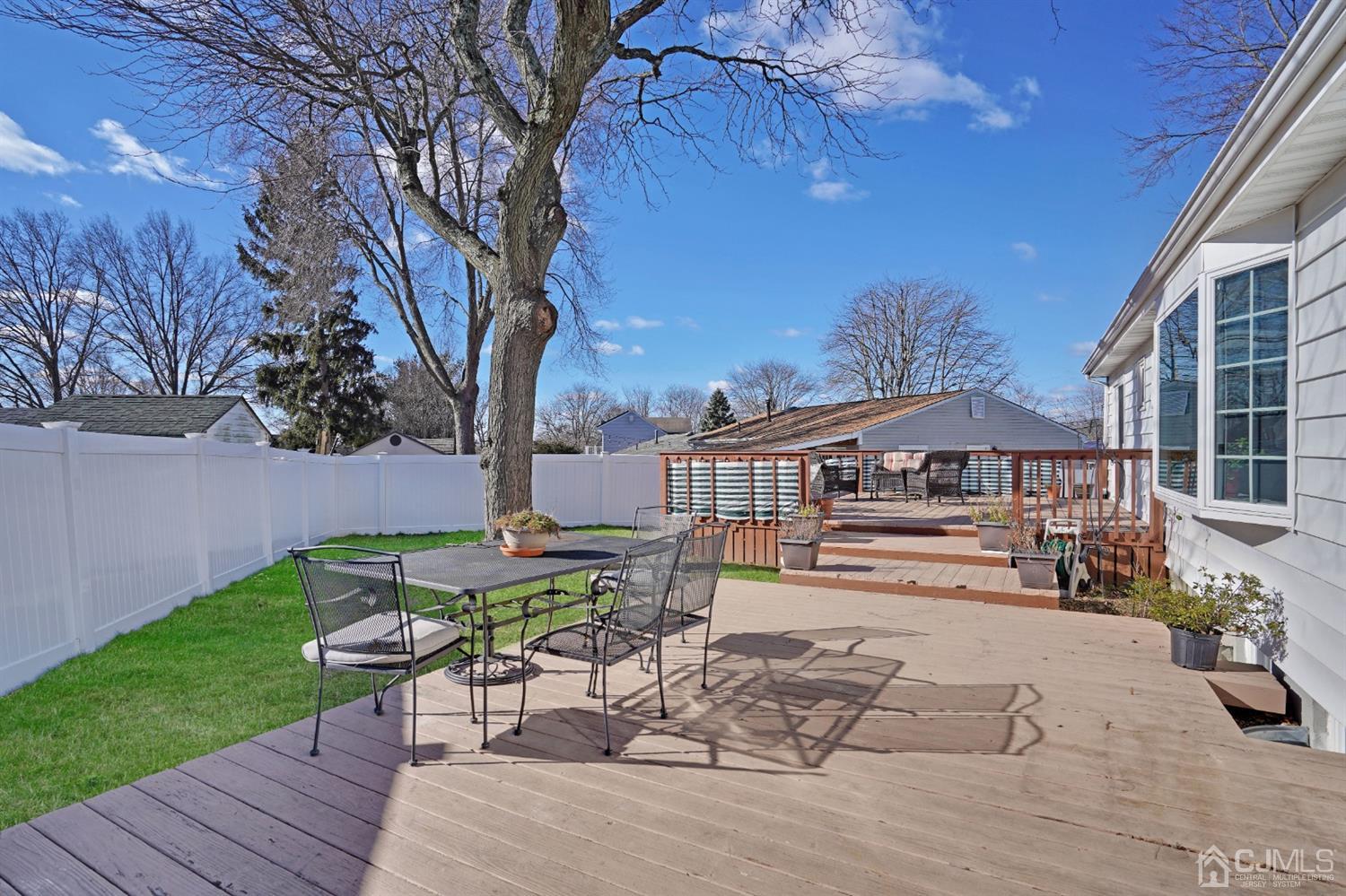 17 Bucknell Road Old Bridge, NJ 08859 - Photo 26 of 28 a house view with a sitting space and garden