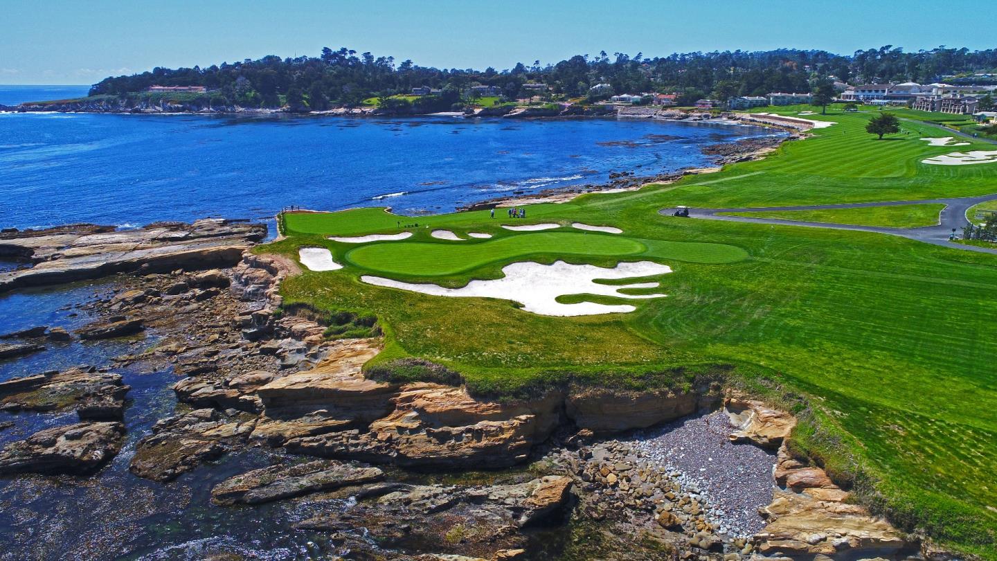 1498 Cypress Drive Pebble Beach, CA 93953 - Photo 11 of 15 a view of a golf course with an ocean