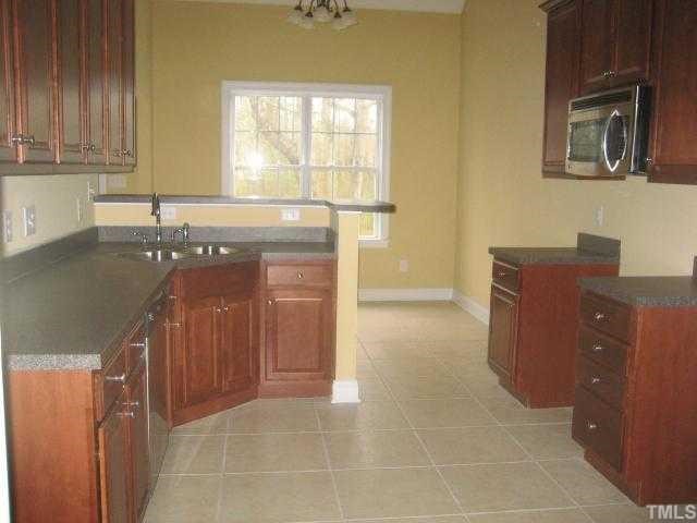 1409 Pearces Road Zebulon, NC 27597 - Photo 8 of 12 Gallery Image 8