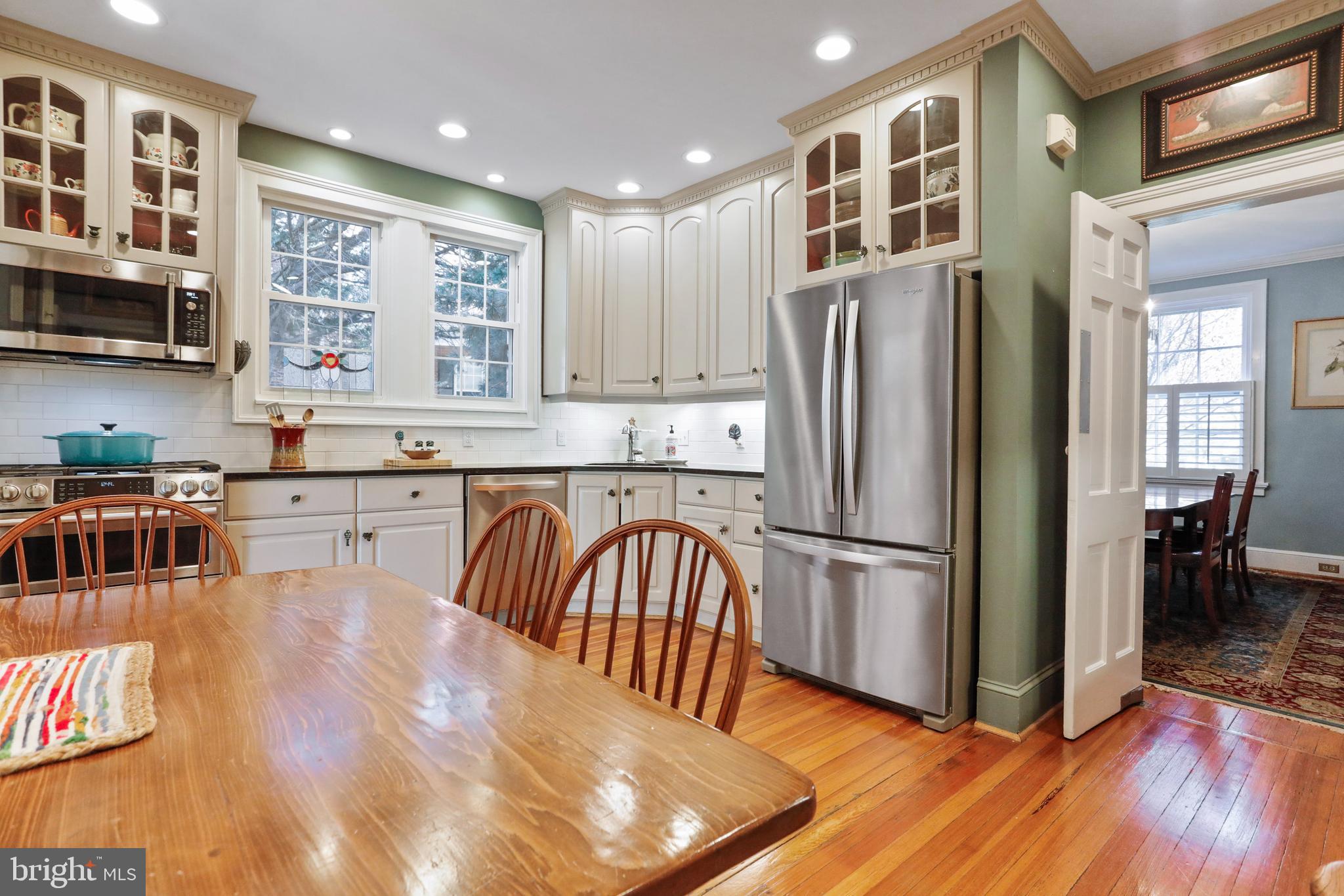 305 College Place Frederick, MD 21701 - Photo 16 of 71 a kitchen with stainless steel appliances granite countertop a refrigerator a stove a sink and a microwave