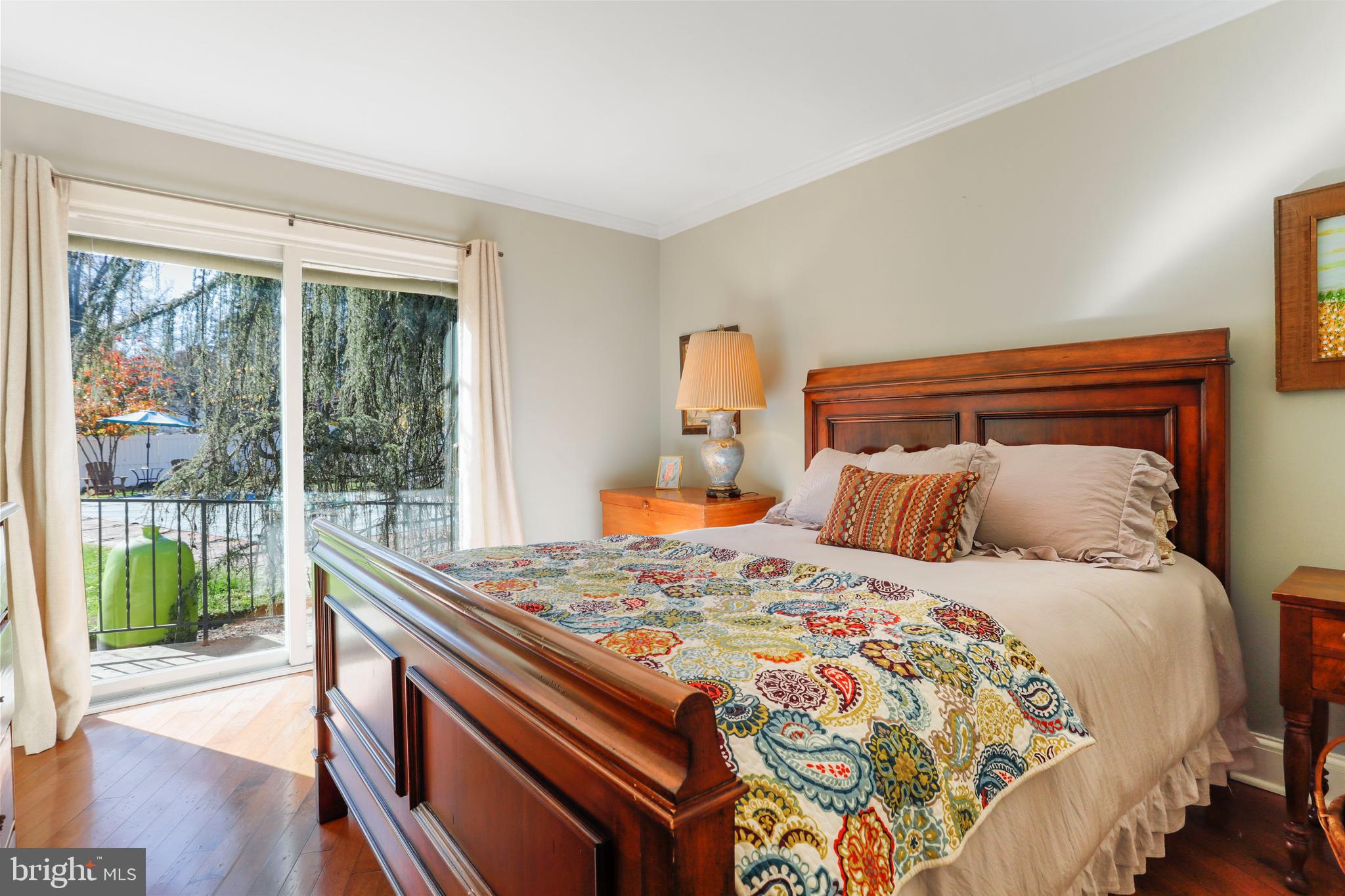 305 College Place Frederick, MD 21701 - Photo 26 of 71 a bedroom with a bed and a large window