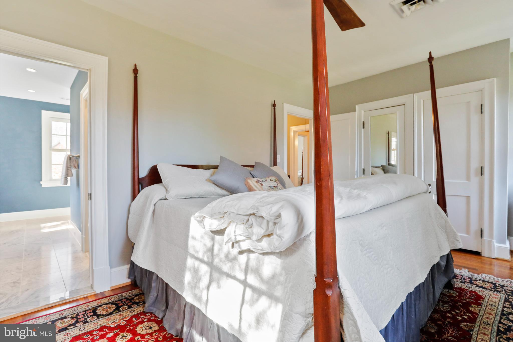 305 College Place Frederick, MD 21701 - Photo 32 of 71 a bed room with a bed and a mirror