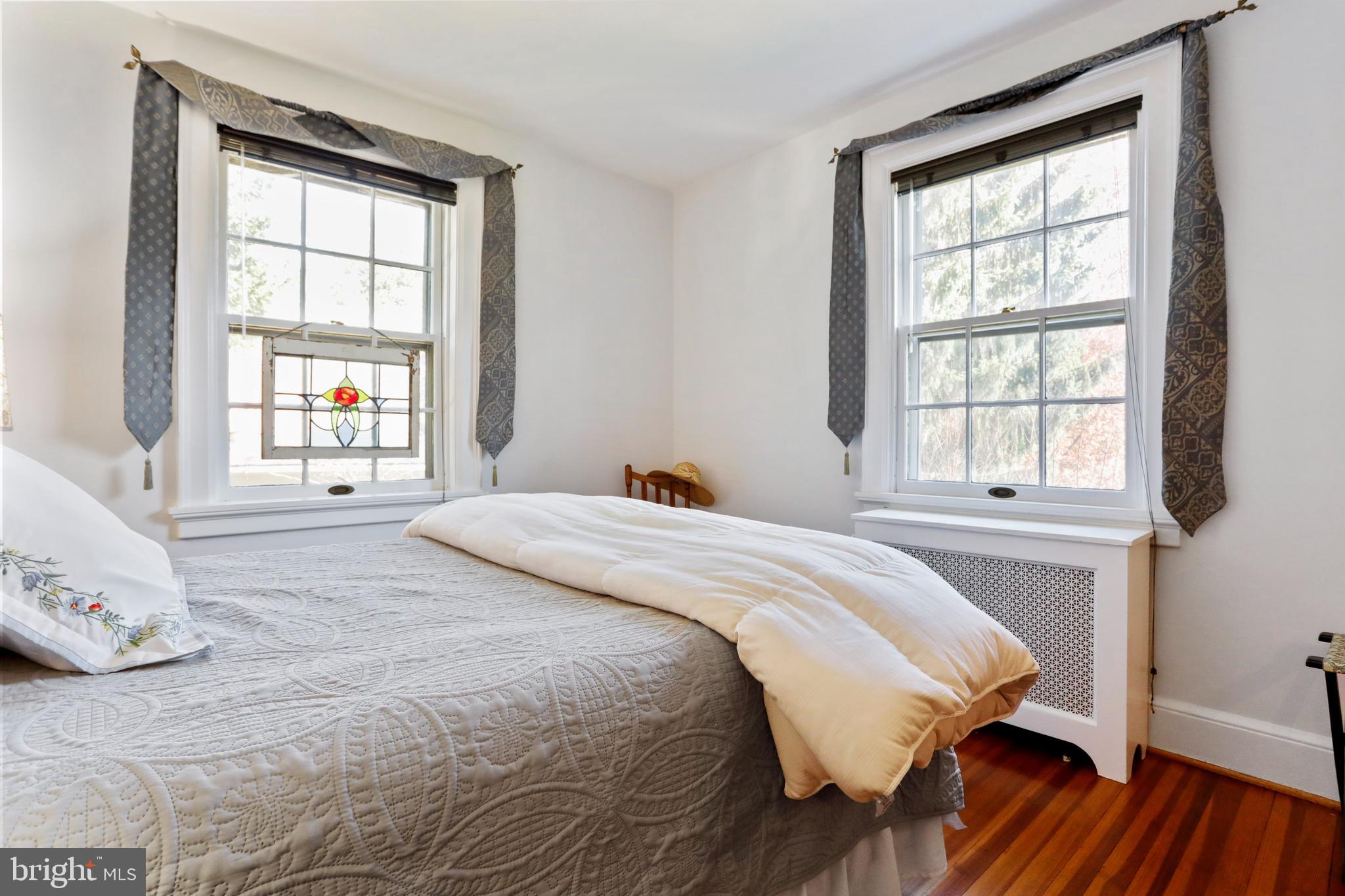 305 College Place Frederick, MD 21701 - Photo 43 of 71 a bedroom with a bed and a window